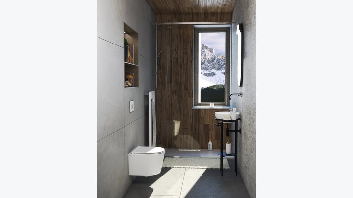 Schales Badezimmer mit Duschkabine, davor ein randloses, wandhängendes WC.