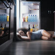 woman sleeping inside fridge refrigerator night heat wave floor african american air conditioning awake black concept copy copy space dark door dream dreaming female frustration girl heat wave hispanic hot insomnia irritation kitchen lying napping open people person pillow problems restless sad sleep sleepless slumber space stress summer sweat sweating tired upset warm young woman sleeping inside fridge refrigerator night heat wave floor african american air conditioning awake black concept copy copy space dark door dream dreaming female frustration girl heat wave hispanic hot insomnia irritation kitchen lying napping open people person pillow problems restless sad sleep sleepless slumber space stress summer sweat sweating tired upset warm young