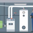 Heating system in the house basement, a plumbler is installing and checking the boiler