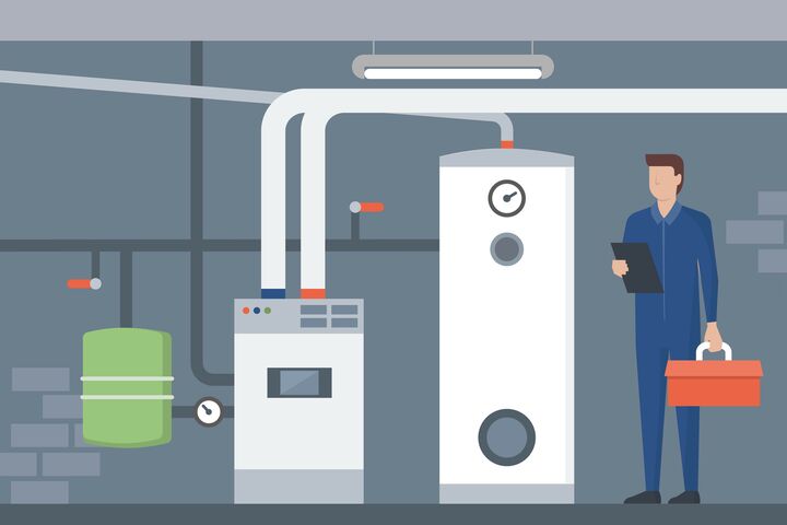 Heating system in the house basement, a plumbler is installing and checking the boiler