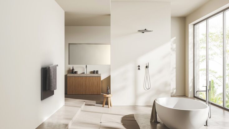 Beige bathroom interior with bathtub on light concrete floor. Sink with mirror, shower and towel rail ladder with accessories, panoramic window on tropics. 3D rendering