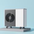 Air heat pump on blue background. Modern, environmentally friendly heating. Air source heat pumps are efficient and renewable source of energy. Banner with copy space for text, advertising. 3d render