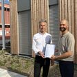 Werner Stutterecker, Leiter des Bachelorstudiengangs Gebäude- und Energietechnik (links) und Lukas Bader, Leiter Energie und Nachhaltigkeitsmanagement bei PKE Energy Automation (rechts)